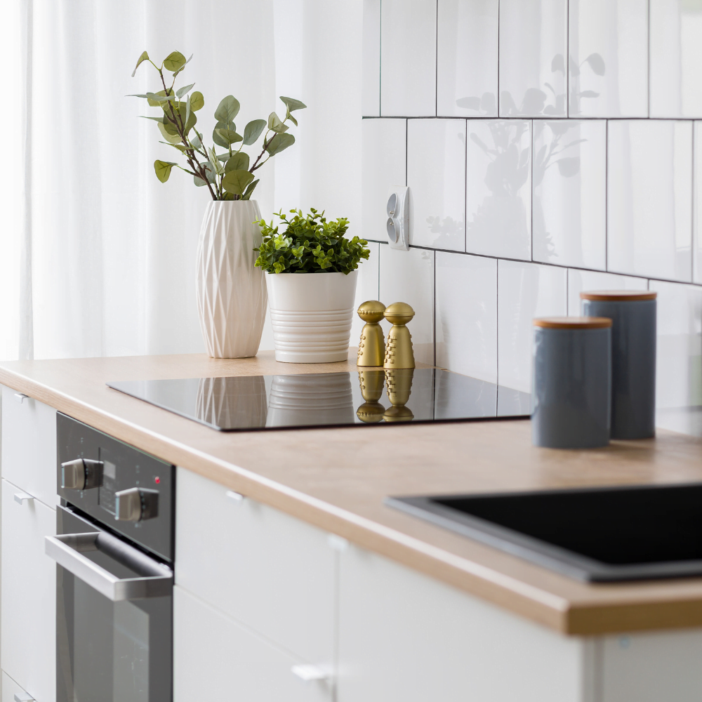 White kitchen with wooden countertop