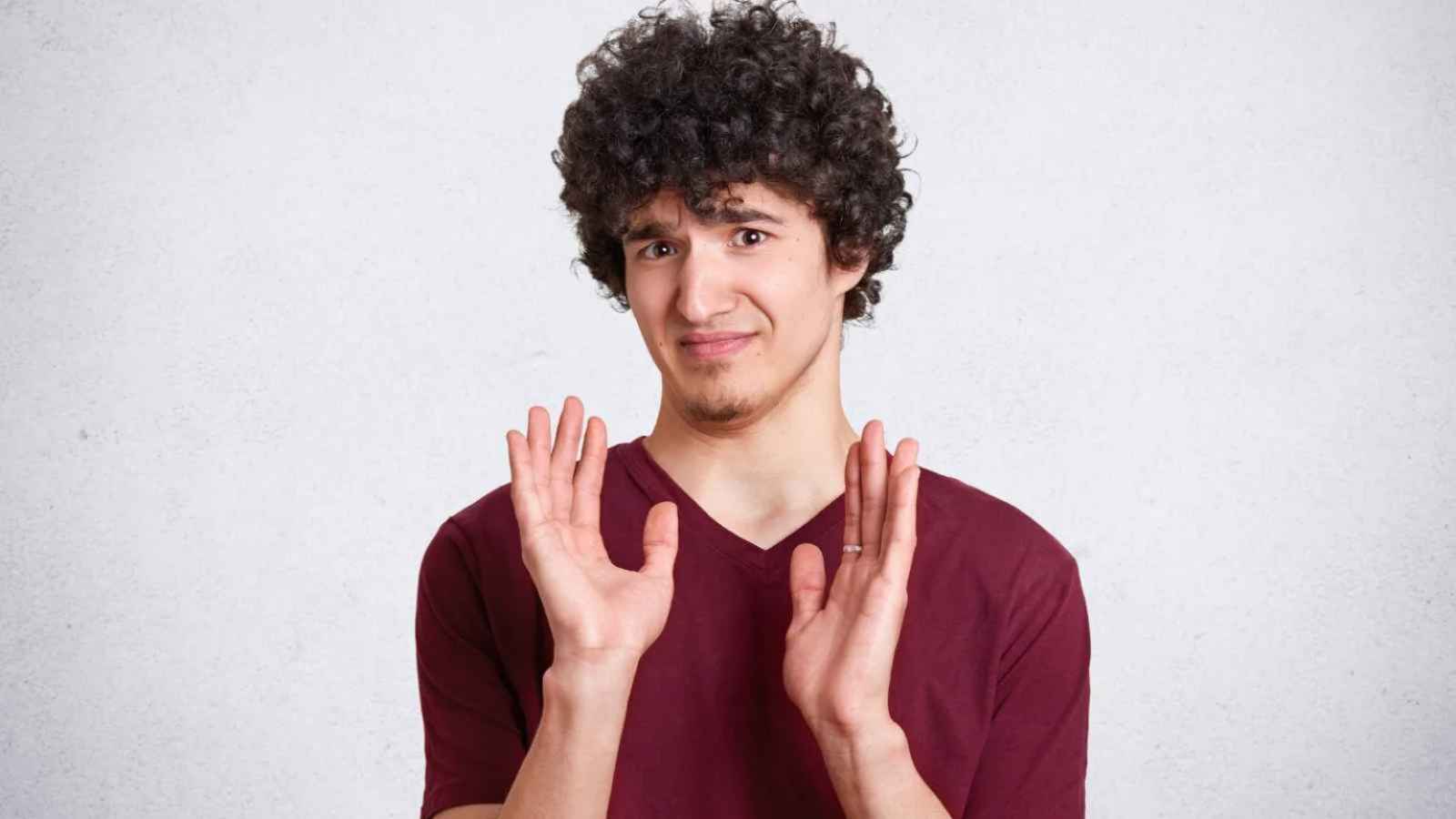 a man raising hands