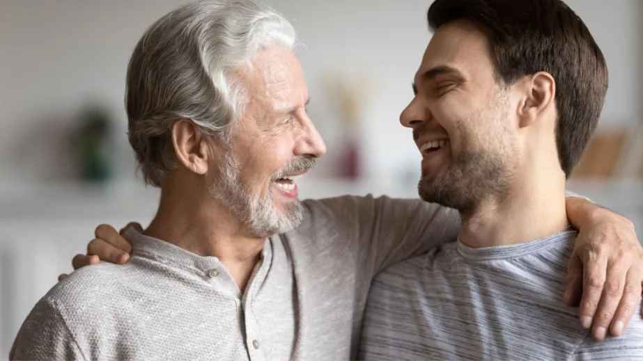dad and son holding each other
