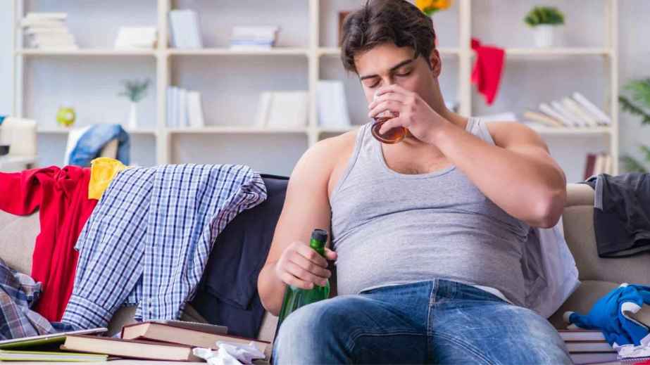 man drinking alcohol