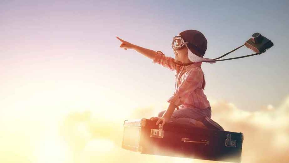 young boy excited to fly