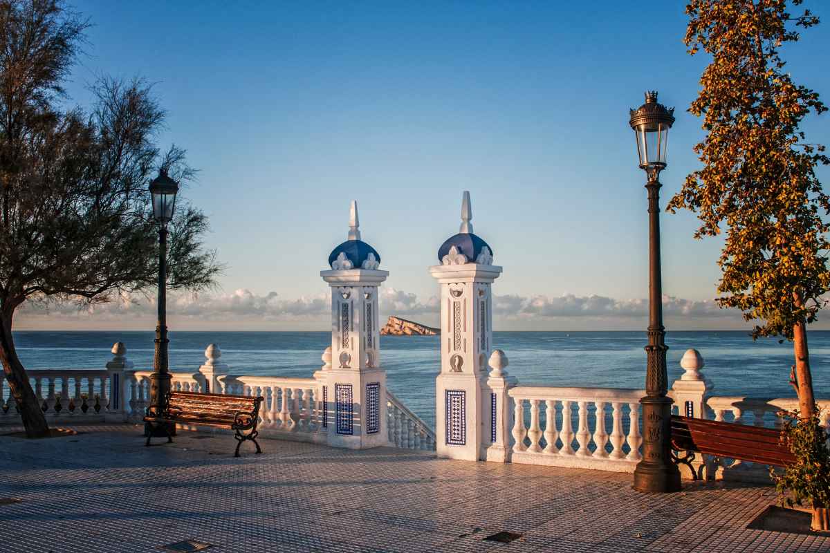 Benidorm on Spain's Costa Blanca is a charming holiday destination with stunning skyscrapers, sun-drenched beaches, and lively nightlife. With mild winter temperatures, it's perfect for a relaxing and exciting getaway. Explore the old town's quaint streets and traditional tapas bars for a glimpse into the region's history.